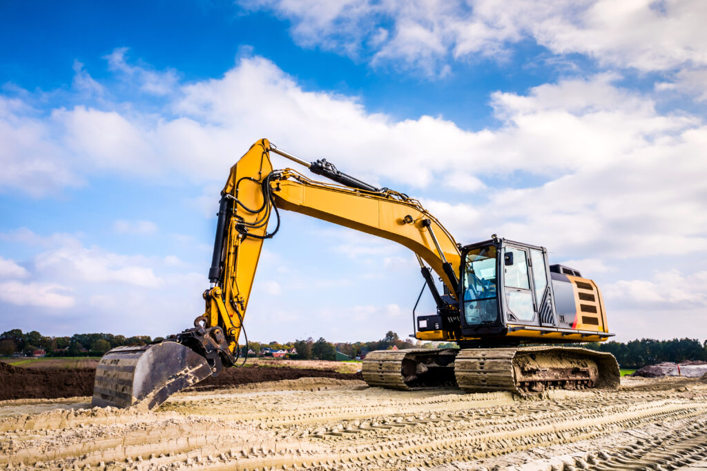 Big excavator in construction site
